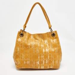 Carolina Herrera Gold/Mustard Monogram Embossed Leather Ring Handle Hobo