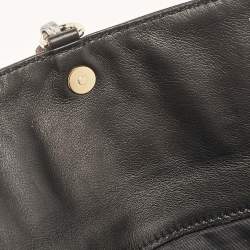 Carolina Herrera Black Monogram Embossed Leather Tassel Clutch