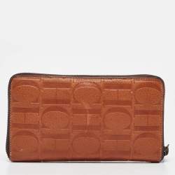 Pre Owned Carolina Herrera Brown Monogram Embossed Leather Zip Continental Wallet