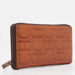 Pre Owned Carolina Herrera Brown Monogram Embossed Leather Zip Continental Wallet