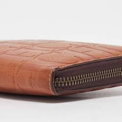 Pre Owned Carolina Herrera Brown Monogram Embossed Leather Zip Continental Wallet