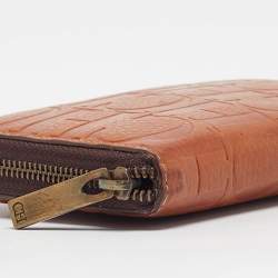 Pre Owned Carolina Herrera Brown Monogram Embossed Leather Zip Continental Wallet
