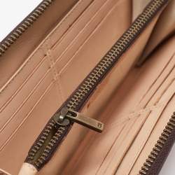 Pre Owned Carolina Herrera Brown Monogram Embossed Leather Zip Continental Wallet