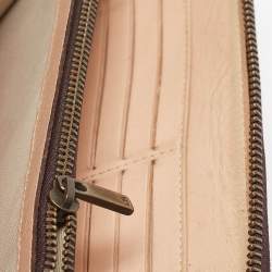 Pre Owned Carolina Herrera Brown Monogram Embossed Leather Zip Continental Wallet