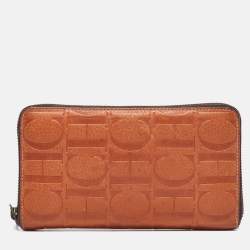 Pre Owned Carolina Herrera Brown Monogram Embossed Leather Zip Continental Wallet