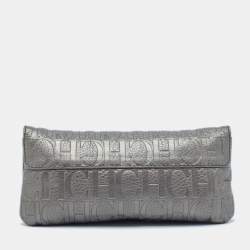 Carolina Herrera Metallic Monogram Embossed Leather Audrey Clutch