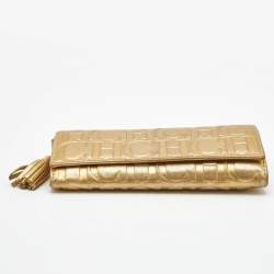Pre Owned Carolina Herrera Gold Monogram Embossed Leather Tassel Flap Continental Wallet