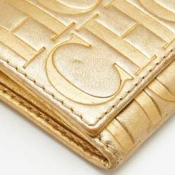 Pre Owned Carolina Herrera Gold Monogram Embossed Leather Tassel Flap Continental Wallet