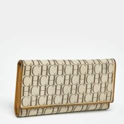 Pre Owned Carolina Herrera Off White Monogram Coated Canvas and Leather Trifold Continental Wallet
