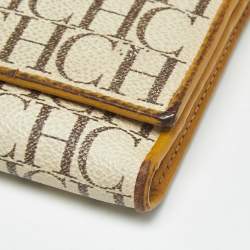 Pre Owned Carolina Herrera Off White Monogram Coated Canvas and Leather Trifold Continental Wallet