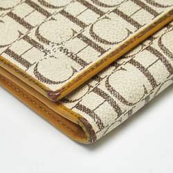 Pre Owned Carolina Herrera Off White Monogram Coated Canvas and Leather Trifold Continental Wallet