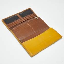 Pre Owned Carolina Herrera Off White Monogram Coated Canvas and Leather Trifold Continental Wallet