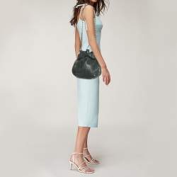 Pre Owned Carolina Herrera Dark Green Monogram Embossed Leather Bow Bucket Bag