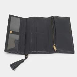 مملوكة مسبقًا Carolina Herrera Black Monogram Embossed Leather Tassel Trifold Continental Wallet