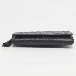 مملوكة مسبقًا Carolina Herrera Black Monogram Embossed Leather Tassel Trifold Continental Wallet