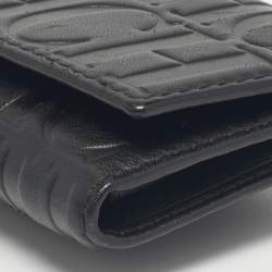 مملوكة مسبقًا Carolina Herrera Black Monogram Embossed Leather Tassel Trifold Continental Wallet