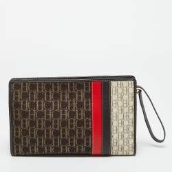 Pre Owned Carolina Herrera Brown/Red Signature Canvas and Leather Wristlet Pouch 