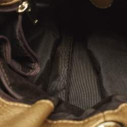 مملوكة مسبقًا Carolina Herrera Bow Gold Monogram Embossed Leather Bucket Bag