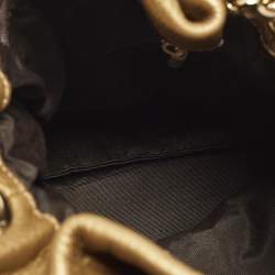 مملوكة مسبقًا Carolina Herrera Bow Gold Monogram Embossed Leather Bucket Bag