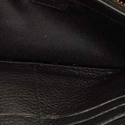 Pre Owned محفظة قلاب كارولينا هيريرا كونتيننتال جلد بنقشة مونوغرام سوداء