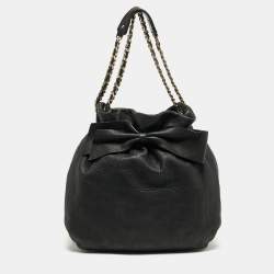 Pre Owned Carolina Herrera Bow Black Monogram Embossed Leather Bucket Bag