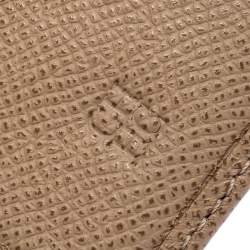 Pre Owned Carolina Herrera Beige Monogram Embossed Leather French Flap Wallet