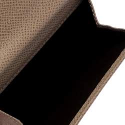 Pre Owned Carolina Herrera Beige Monogram Embossed Leather French Flap Wallet