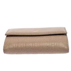 Pre Owned Carolina Herrera Beige Monogram Embossed Leather French Flap Wallet