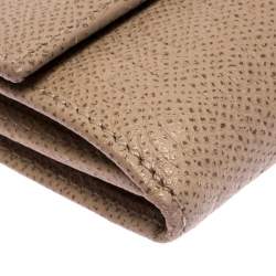 Pre Owned Carolina Herrera Beige Monogram Embossed Leather French Flap Wallet