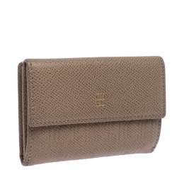 Pre Owned Carolina Herrera Beige Monogram Embossed Leather French Flap Wallet