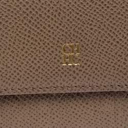 Pre Owned Carolina Herrera Beige Monogram Embossed Leather French Flap Wallet