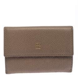 Pre Owned Carolina Herrera Beige Monogram Embossed Leather French Flap Wallet
