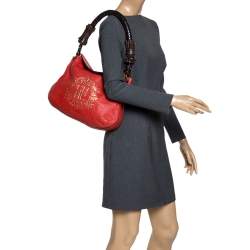 Pre Owned Carolina Herrera Orange/Brown logo Leather Braided Handle Hobo