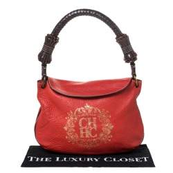 Pre Owned Carolina Herrera Orange/Brown logo Leather Braided Handle Hobo