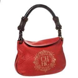 Pre Owned Carolina Herrera Orange/Brown logo Leather Braided Handle Hobo