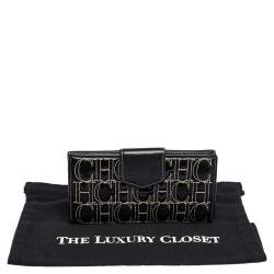 Pre Owned Carolina Herrera Black Monogram Embossed Patent Leather Flap Continental Wallet