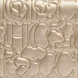 Pre Owned Carolina Herrera Metallic Gold Floral Embossed Leather Bifold Continental Wallet