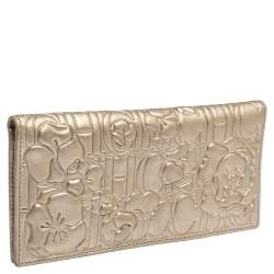 Pre Owned Carolina Herrera Metallic Gold Floral Embossed Leather Bifold Continental Wallet