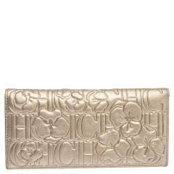 Pre Owned Carolina Herrera Metallic Gold Floral Embossed Leather Bifold Continental Wallet