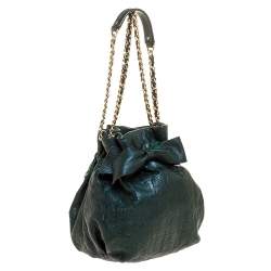 Pre Owned Carolina Herrera Dark Green Monogram Embossed Leather Bow Bucket Shoulder Bag