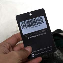 Pre Owned Carolina Herrera Dark Green Monogram Embossed Leather Bow Bucket Shoulder Bag