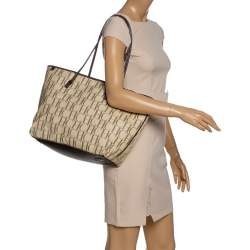 Pre Owned Carolina Herrera Beige/Brown Monogram PVC and Leather Shopper Tote