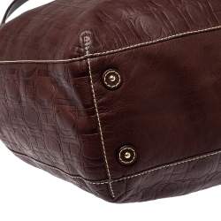 Pre Owned Carolina Herrera Dark Brown Monogram Embossed Leather Drawstring Oversized Tote