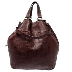 Pre Owned Carolina Herrera Dark Brown Monogram Embossed Leather Drawstring Oversized Tote