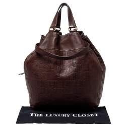Pre Owned Carolina Herrera Dark Brown Monogram Embossed Leather Drawstring Oversized Tote