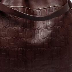 Pre Owned Carolina Herrera Dark Brown Monogram Embossed Leather Drawstring Oversized Tote