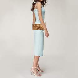 Pre Owned Carolina Herrera Gold Monogram Embossed Leather Bow Chain Clutch