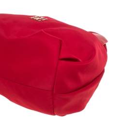 Pre Owned Carolina Herrera Red Nylon and Leather Bow Drawstring Hobo