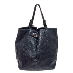 Pre Owned Carolina Herrera Navy Blue Embossed Monogram Leather Buckle Tote