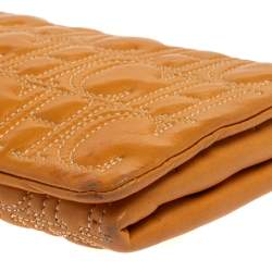 Pre Owned Carolina Herrera Mustard Monogram Embossed Leather Flap Clutch